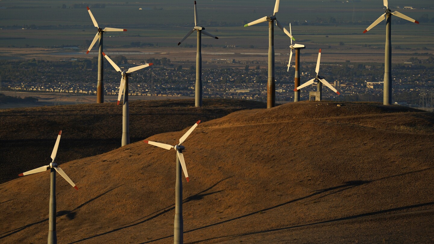 Photo of US energy panel approves rule to expand transmission of renewable power | AP News