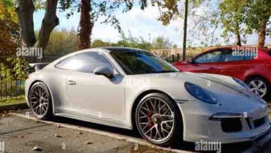 Photo of A 17-year-old boy who works part-time at Pizza Hut drives up to park in front of the house in a beautiful Porsche